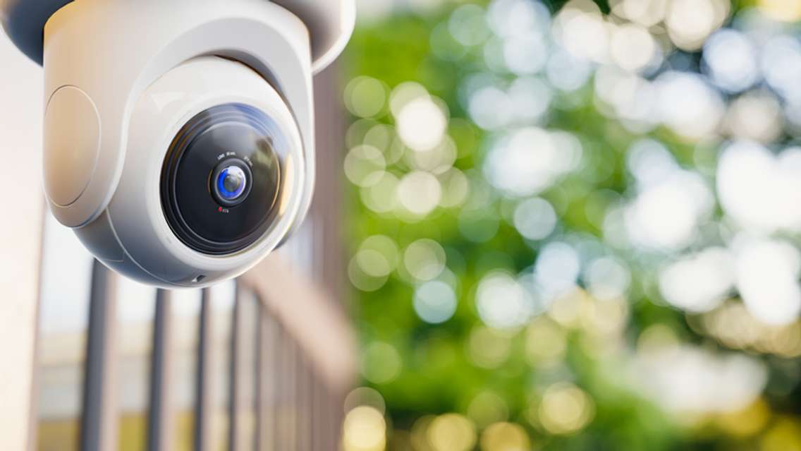 Photo of security camera by oatintro via iStock / Getty Images Plus