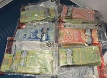 Cash that was seized after Chatham-Kent police executed a Controlled Drugs and Substances Act warrant in Chatham on June 9, 2020. (Photo courtesy of Chatham-Kent police)