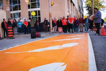 UNDRIP Committee unveiled a new Residential Schools Memorial Crosswalk at the corner of Front Street and Lochiel Street. September 30, 2022. (Photo courtesy of the City of Sarnia)