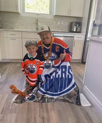 Easton Oetting and his dad DJ cheering on the Edmonton Oilers. (Photo by DJ Oetting)