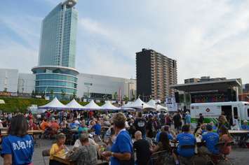 Music performers and music lovers gather at Windsor's Riverfront Festival Plaza for the 21st annual Bluesfest. (Photo by Blackburn Radio's Summer Patrol)