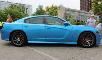Chrysler models old and new are shown off during the FCA Canadas 90th Anniversary celebration on Windsors riverfront, June 17, 2015. (Photo by Mike Vlasveld)
