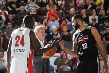 Former MLSE head Richard Peddie handles the ball toss in the Windsor Express vs Raptors 905 exhibition game on November 5, 2015. (Photo by Ricardo Veneza)