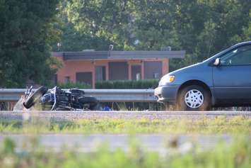 Police investigate a motorcycle crash on EC Row at Howard Ave., August 18, 2015. (Photo by Jason Viau)