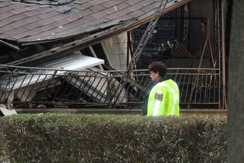 Officials from the Office of the Ontario Fire Marshal are investigating a house explosion in the 1400-block of Francois Rd. in Windsor, October 21, 2015.  (Photo by Adelle Loiselle)