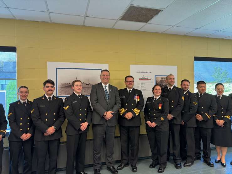Lambton College President and CEO Rob Kardas (fourth from right) is joined by members of the navy at a classroom dedication to HMCS Sarnia. May 9, 2024 Blackburn Media photo by Melanie Irwin.