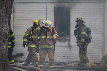Windsor fire crews battle a blaze at 1574 Gladestone Ave., April 7, 2015. (Photo by Jason Viau)