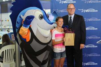 Newly named FINA mascot Splasher is seen with naming competition winner Julianne Pella and Mayor Drew Dilkens on July 14, 2015. (Photo courtesy City of Windsor)