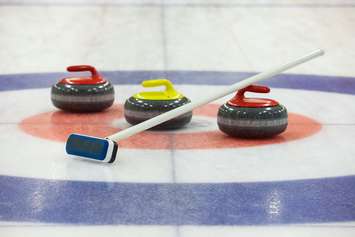 Curling rocks. © Can Stock Photo Inc. / gornostaj