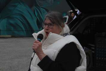 Shirley Roebuck of the Ontario Health Coalition speaks at a protest in Windsor on December 12, 2022. Photo by Mark Brown/WindsorNewsToday.ca.