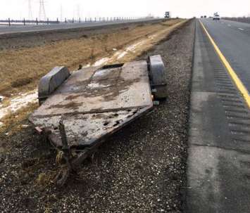 Chatham-Kent OPP say this trailer became detached from a pickup truck on the 401, Saturday, March 5. (Photo courtesy of OPP)
