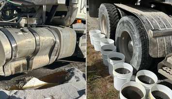 Sarnia Fire Rescue crews contain a leak of hydraulic fluid after a transport crash - Oct. 21/25 (Photo courtesy of Sarnia Fire Rescue via Facebook)