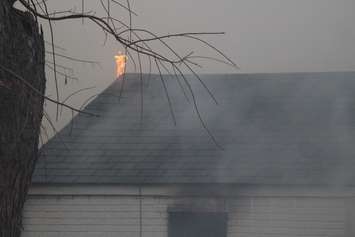 Windsor fire crews battle a blaze at 1574 Gladestone Ave., April 7, 2015. (Photo by Jason Viau)
