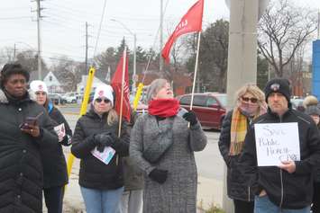 Protestors on Tecumseh Road East and Walker Road, Windsor, December 12, 2022. Photo by Mark Brown/WindsorNewsToday.ca.