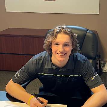 Owen MacDonald signs a standard player agreement with the Sarnia Sting - Mar 4/22 (Photo courtesy of Sarnia Sting)