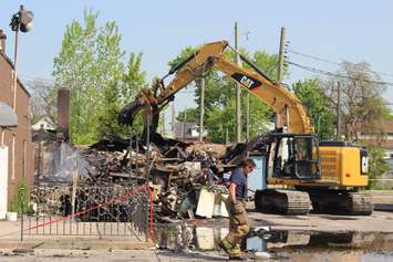 The investigation into Monday's fire on Wyandotte St. E between Parent Ave. and Marentette St. in Windsor continues.  (Photo by Adelle Loiselle)