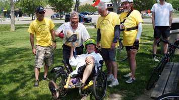 St. Clair Township Mayor Steve Arnold tries out a bicycle used in the 2nd annual 