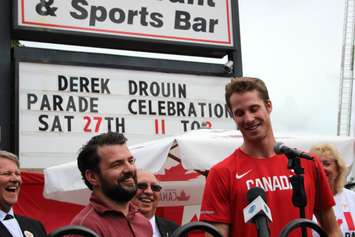 CHOK's Jake Jeffrey acts as Emcee for Derek Drouin's Olympic homecoming in Corunna Aug. 27, 2016 (BlackburnNews.com photo by Dave Dentinger)