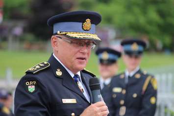 Former OPP Commissioner Chris Lewis attends the naming ceremony for the newest OPP marine vessel, which now carries his name, held at the Leamington Marina on June 23, 2016. (Photo by Ricardo Veneza)