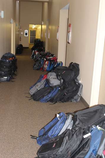 Backpacks line the halls at United Way in Chatham for operation backpack. August. 29, 2016. (Photo by Natalia Vega)