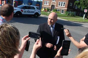 Staff Sgt. Matthew D'Asti speaks with the media about a gunman in the area of Pillette Rd., June 1, 2016. (Photo by Jason Viau)