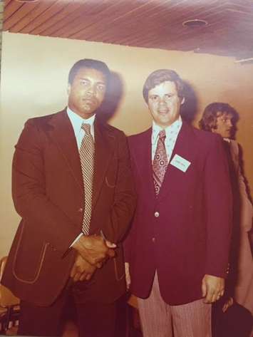 Muhammad Ali with former Blackburn Sports Director George Heath at the Sarnia Sertoma Sports Celebrity Dinner in 1974. (Photo submitted by George Heath) 