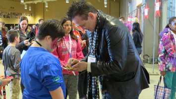 Former Toronto Maple Leafs Captain Doug Gilmour signs autographs at the We're All Stars Celebration in London, February 23, 2016. Photo by Miranda Chant.