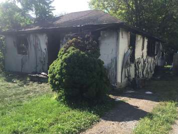 A Reaume Ave. fire has gutted one home in Wallaceburg and caused heat damage to a neighbouring home.
(Photo by Blackburn Radio Summer Patrol)