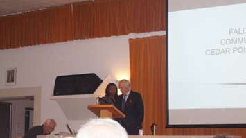Julian Falconer and Asha James address crowd at Camlachie Community Centre May 26, 2015. (BlackburnNews.com Photo by Briana Carnegie)