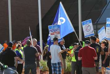 Paramedics and union officials stand outside the Chatham-Kent Civic Centre, June 27, 2016 (Photo by Jake Kislinsky)