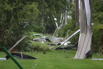 Crews assess and clean up the damage left near the EC Row Expressway and Central Avenue in Windsor on August 25, 2016 after a tornado hit the area. (Photo by Ricardo Veneza)