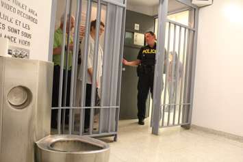 Members of the public are taken on a tour of the Chatham-Kent OPP detachment on May 19, 2016. (Photo by Ricardo Veneza)