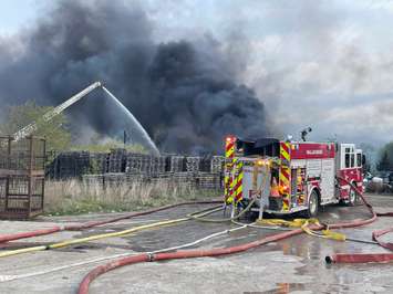 The scene of a large pallet fire in Wallaceburg. (Photo courtesy of Chatham-Kent Fire and Emergency Services)