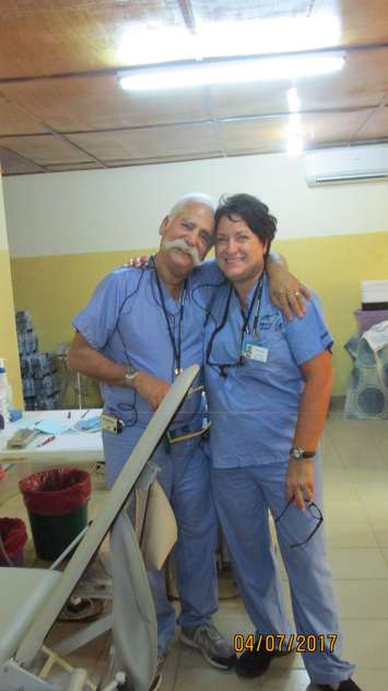 London dental hygienist Diane Schultz with a fellow volunteer during a mission to Africa with Mercy Ships Canada. Photo courtesy of Diane Schultz.