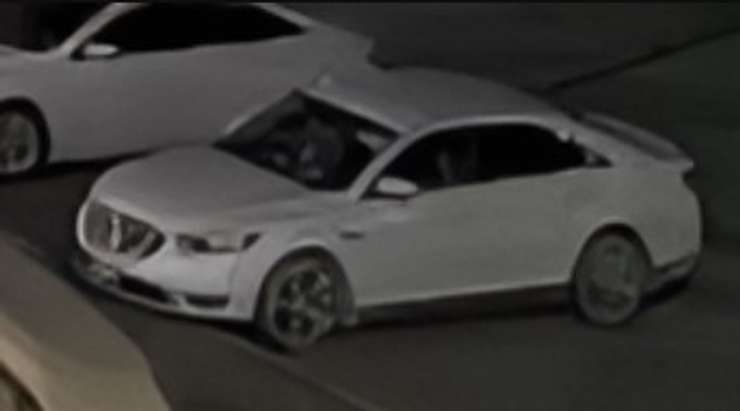 A white Ford Taurus connected to a South Windsor break-and-enter is seen on surveillance footage, March 25, 2024. Image provided by Windsor police.