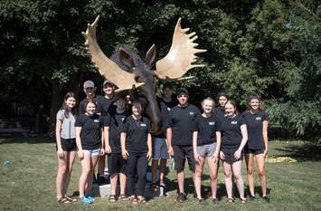 The staff at Willy's Burger Bar welcoming Bruce the Moose on July 31, 2020. (Submitted photo)