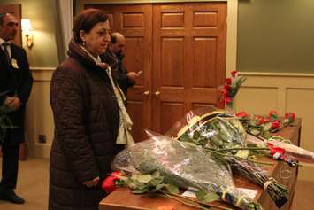 Sinam Mohamed, European Representative of the Rajava Demorcratic Adminsitration, part of fallen veteran and Wheatley native John Gallagher's repatriation ceremony pays her respects at the Blenheim Community Funeral Home on November 20, 2015. (Photo by Ricardo Veneza)