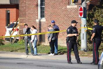 Police investigate after a girl was hit by a vehicle at Tecumseh Rd. W and Dougall in Windsor. (Photo by Adelle Loiselle)
