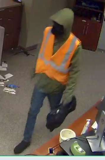 One of three suspects involved in an armed robbery at a bank on Arkona Road. April 5, 2023. Photo via OPP.