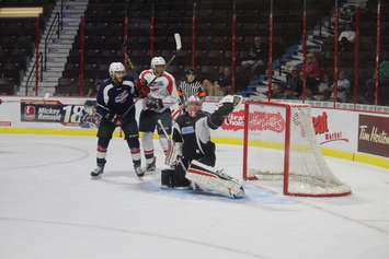 Brock Baier makes a glove save playing in the Windsor Spitfires annual Blue and White game on August 31, 2016. (Photo by Ricardo Veneza)