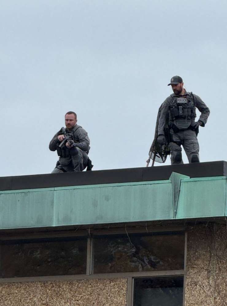 Members of the Sarnia Police Service mounted on a rooftop near Veterans Park. November 11, 2024. (Submitted photo) 