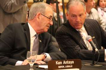 LaSalle Mayor Ken Antaya and LaSalle Deputy Mayor Mark Bondy speak with each other at the inaugural County Council meeting at the Ciociaro Club on December 10, 2014. (Photo by Ricardo Veneza)