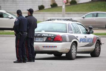 Windsor police investigate a stabbing in the 400 block of Glengarry Ave., April 22, 2015. (Photo by Jason Viau)