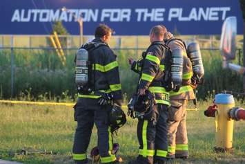 Windsor firefighters on scene of a blaze on Memorial Drive, July 9, 2018. Photo by Mark Brown/Blackburn News