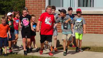 Bothwell student Joey DeNuke leads his schoolmates on their Terry Fox Run (Photo by Jake Kislinsky)