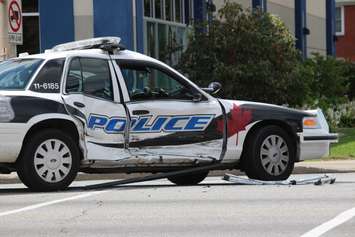 A Windsor police cruiser was involved in a crash at Ouellette and Giles, August 20, 2015. (Photo by Jason Viau)