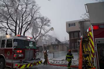 Windsor fire crews battle a blaze in the 700-block of Windsor Ave., February 18, 2015. (Photo by Roy Kang)