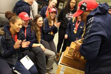 Windsor Lancers women's basketball team arrives at Windsor airport after winning their fifth-straight national championship. (Photo by Jason Viau)