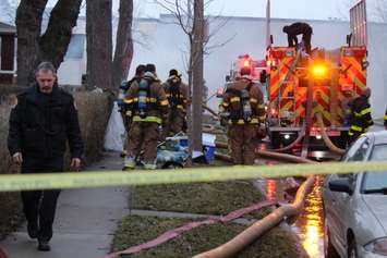 Windsor fire crews battle a blaze at 1574 Gladestone Ave., April 7, 2015. (Photo by Jason Viau)