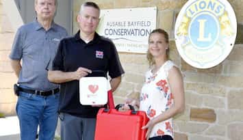ABCA Vice Chair David Marsh, Dave Mounsey Memorial Fund Executive Director and Co-Founder Patrick Armstrong, and ABCA Workplace Safety Specialist Stacey Palen. July 30, 2026. (Photo courtesy of the Ausable Bayfield Conservation Authority). 